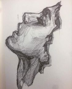 a black and white drawing of a person's head on a piece of paper