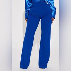 Elevate Your Work Wardrobe With These Stunning Victoria High-Waisted Dress Pants From Fashion Nova. Crafted From Premium Quality Materials, These Pants Are Designed To Offer Exceptional Comfort And Style. The Pants Feature A Flattering Fit That Accentuates Your Curves And Flatters Your Figure, While The Blue Color Adds A Touch Of Sophistication To Your Look. With A Regular Size Type And S Size, These Pants Are Perfect For Women Who Want To Make A Statement At Work Or Any Formal Occasion. The Pan Blue Elastane Dress Pants With Pockets, Fitted Elastane Dress Pants For Summer, Spring Party Dress Pants In Elastane, Spring Party Dress Pants, Fitted Dress Pants For Party, Fitted Dress Pants With Pockets For Party, Blue Straight Elastane Dress Pants, Spring Party Dress Pants Made Of Elastane, Elegant Blue High-waisted Pants