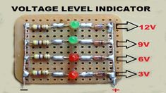 the voltage level indicator is displayed on an electronic board with several different types of wires