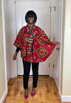 This beautiful african cape is a beautiful fashion accessory that can be worn to make a fashion statements in a variety of ways. This cape be worn as a cape on any solid print or pant. It can also be worn as train on any pant and accessorized to give a chic look. This african cape is ready to ship. One Size Traditional Long Sleeve Cape, Traditional One-size Long Sleeve Cape, Traditional Long Sleeve Cape One Size, Traditional One-size Cape Poncho, Red One-size Cape Shawl, Traditional Long Sleeve Cape, Multicolor Cape Shawl One Size, Red One Size Cape, Multicolor Shawl Cape One Size