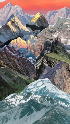 the mountains are covered in snow and green grass, as well as red sky above them