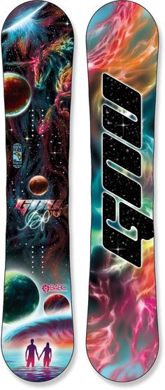 a snowboard with an image of two people standing in front of the space and stars