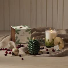 Delicately handcrafted to burn and glow beautifully, Frasier Fir's Molded Pinecone candle is sure to be the a standout in your home for this holiday season and beyond. Complete with a gold tray, the beautiful details of this deep green candle makes a unique home decor piece. 11.5 CM H x 9 CM D Pinecone Candle, Living Room Halloween Decor, Thymes Frasier Fir, Travel Tin Candles, Frasier Fir, Pine Cone Candles, Gold Tray, Mickey Mouse Halloween, Nightmare Before Christmas Halloween