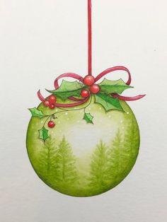 a watercolor painting of a christmas ornament with holly and berries on it