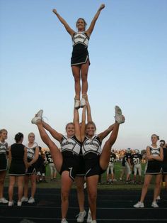 two cheerleaders on top of each other with the caption'oh you play football that's cute, we throw 100 pound girls & you throw 2 pound