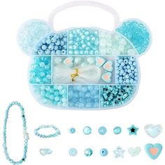 an assortment of beads and accessories in a plastic case