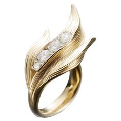 This contemporary Lily of The Valley Ring is made of 18 karat yellow gold and 4 round diamonds (0,65 carats). It has a sculptural shape. We use the best natural diamonds VS, F-G, we work with German gemstone companies that have been in business since the 19th century. The ring can be personalised with a name or a saying. Please allow us time to customize the ring. The ring can be ordered as usual fashion ring. The size and the colour of the gold can be changed. Sculptural Engagement Ring, Ring Sculpture, Sculptural Ring, Time Jewelry, Art Jewelry Design, Round Sapphire, Contemporary Ring, Fine Art Jewelry, Ring With Diamond