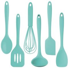 the kitchen utensils are all mint green