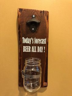 a wooden sign that says today's forecast beer all day with a mason jar on it