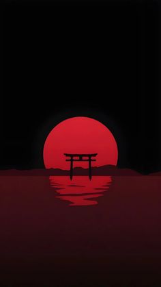 the sun is setting over water with a tori tori floating in it