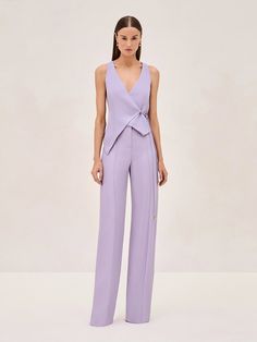 Experience the elegance of simplicity with the Cain Vest. Featuring a deep V-neckline and a wrap silhouette, secured by a side tie that emphasizes the waist. Paired perfectly with the Rex Pant, this duo will be your go to this summer. Modern Pantsuit Women, Women 2 Piece Suit, Cinched Waist Coat, Cocktail Attire Women Pants, Pant Dresses For Women, T Silhouette Fashion, Women's Pant Suit, Fun Formal Outfits, Gender Neutral Wedding Guest Outfit