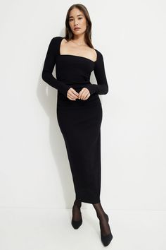 This rib knit maxi dress is designed to have a bodycon fit. Features - Straight neck - Draping and ruching at front - Bolero-style long sleeves Size & Fit - Bodycon - Stretch fabric - Model is wearing size XS Materials & Care - 92% rayon, 8% spandex - Machine wash, cold - Imported