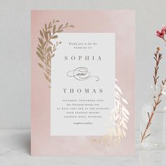 a pink and gold wedding card with the words sophiia and thomas on it