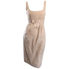 Adorable 1990s MOSCHINO CHEAP & CHIC khaki / beige sleeveless babydoll dress! Features embroidered flowers throughout, with a chic bow detail at upper waist. Hidden zipper up the side with hook-and-eye closure. In great condition. Made in Italy Marked Size US 4 Measurements: 32 inch bust 26 inch waist 36 inch hips 37 inches from top back shoulder seam to hem Beige Dress Outfit, Vintage 90s Dress, Sunday Dress, Moschino Cheap And Chic, Designer Evening Dresses, 90s Dress, Beige Dresses, Vestidos Vintage, Feel Pretty