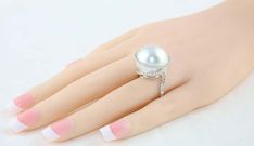 For Sale on 1stDibs - Custom One-of-Kind Ring The ring is 18K White Gold The pearl is 18MM South Sea Pearl There are 1.16 Carats in Diamonds G/H SI The ring is a size 6.5, sizable