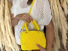 Discover the charm of handmade with this one-of-a-kind crochet yellow summer purse. Skillfully crafted with love and attention to detail, each stitch showcases the artisan's dedication to quality. Perfect for adding a pop of color to your outfit, this purse is both stylish and functional. Ideal for anyone who appreciates unique accessories or as a thoughtful gift. Size & Materials: Polyester cord with stainless steel accessories Size of the purse is approx. 8 x 6 x 1.75 inches Size of the handle is approx. 12 inches (long one), 3.5 inches (short one) Please note - each piece is meticulously crafted, ensuring that every crochet purse is a one-of-a-kind accessory. We are not able to repeat the same item, due to creativity and uniqueness of our artisan. Check out more styles & colors here: ht Crochet Yellow, Yellow Purse, Summer Fashion Women, Summer Purse, Yellow Purses, Shoulder Bag Vintage, Summer Purses, Steel Accessories, Stainless Steel Accessories