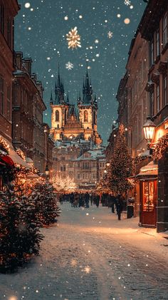 a snowy street with people walking on it and buildings in the background at christmas time