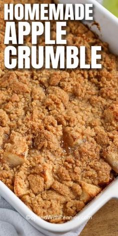 homemade apple crumble in a white dish on a wooden table with text overlay