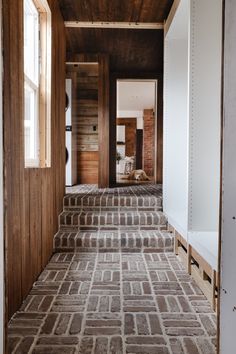 an empty room with some stairs leading up to it