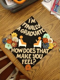 a graduation cap that says i'm finally graduate how does that make you feel?