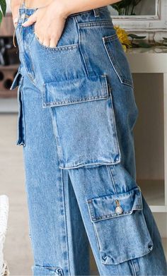 Relaxed fit cargo style denim. Medium wash denim.