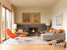 a living room filled with furniture and a fire place