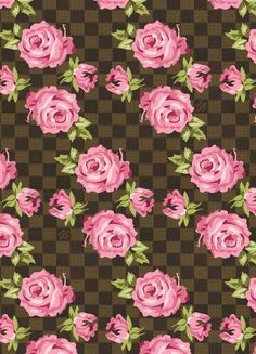 a checkered background with pink roses on it