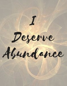 the words i desivee abundance are written in black ink on a beige background