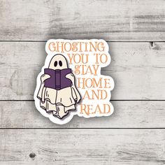 a sticker that says, ghosting you to stay home and read on it