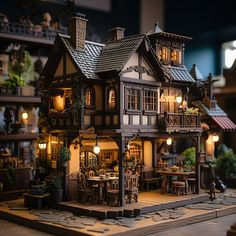 a doll house is set up on a table