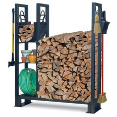 the firewood rack is holding many logs