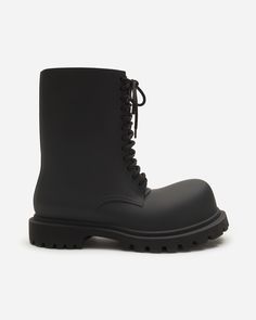 The 12-eyelet lace-up Steroid Boot with rounded toe in monochrome EVA exaggerates volumes while maintaining a light weight. Balenciaga Boots, Black Balenciaga, Eyelet Lace, Thing 1 Thing 2, Earn Money, Online Boutique, Balenciaga, Shop Now, Lace Up