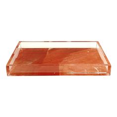 an orange marble tray on a white background