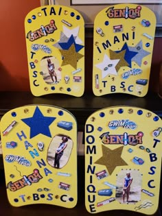 three yellow plates with pictures and words on them, all decorated in different shapes and sizes