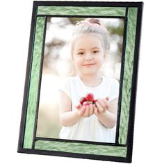 PRICES MAY VARY. This picture frame features a soft green translucent glass with metal edging finished in a charcoal grey patina Easel back tabletop photo frame holds 5 x 7 vertical or horizontal photo on any tabletop, dresser or shelf. Home decor keepsake frame perfect for family vacation pictures. Handcrafted stained glass keepsake frame made with lead free solder to protect you and the environment Designed and Manufactured by J Devlin Glass Art A photo frame simple enough to fit any home deco Stained Glass Picture Frame, Stained Glass Frames, Green Picture Frames, Glass Picture Frame, Soft Green Color, Glass Photo Frames, 5x7 Picture Frames, Tabletop Picture Frames, Glass Picture Frames