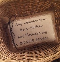 a woven pillow that says, any woman can be a mother but you're my bonus mom