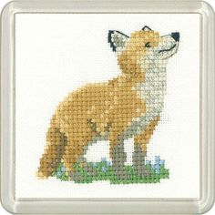 a cross stitch picture of a fox