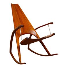 a wooden rocking chair with glass straps