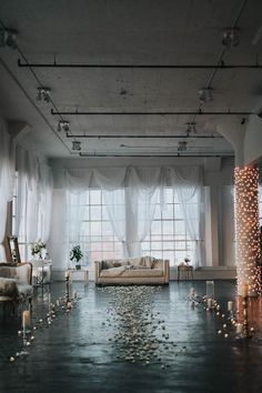 a living room filled with lots of candles