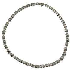 Tiffany & Co. Signature X Diamond Necklace Style: Tennis Metal: 18kt White Gold 60 grams Size / Measurements: 16.75' Inches - 8 mm width Main Diamond: 36 Round Brilliant Diamonds ~ 1.06 tcw F-G, VS Hallmark: ©T&Co. 750 Includes: T&C Inner & Outer Blue Necklace Boxes Sku#110500QDALD-KPD-1.08TCWGVS Necklace Box, Tiffany And Co, Blue Necklace, Tiffany & Co., Round Brilliant, Diamond Necklace, Choker Necklace, Jewelry Necklaces, White Gold