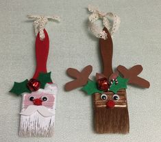 two christmas decorations made to look like santa's beards and reindeer nose ornaments