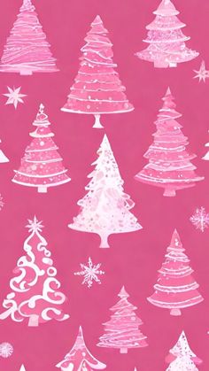 pink and white christmas trees with snowflakes on them