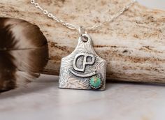 Want 20% off this item? Go here to claim your coupon code! https://pintody.com/pages/discountsPersonalize with your initial or brand off to one side like photo. If your adding your brand please send me your artwork after purchasing from your purchases. This helps keep all communication together. This cattle tag necklace is made of solid sterling silver that can be customized with your brand or initial. This tag features a floral background with a 5mm turquoise stone. Each stone is different as t Western Fashion Jewelry, Cattle Tags, Bf Gifts, Cowgirl Jewelry, Ear Tag, Western Earrings, Necklace Craft, Necklace Brands, Western Jewelry