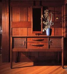 a book cover with a wooden dresser and mirror