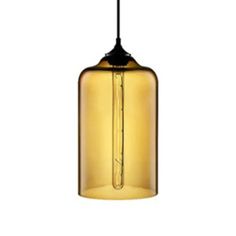 a yellow glass light hanging from a ceiling