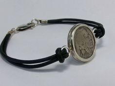 I made this Beautiful Coin bracelet as sample, This is only one I have in stock but I do custom design orders. If you have your coin and like to be set and make your coin bracelet then you can send me your coin and i will make and turn your coin like this bracelet. The coin is set in Silver bezel, All handmade. The coin is very secure and safe set in bezel. Leather strap with silver lock at the end. I can make any length like 7in, 8in or 9in or any other length. The length will be total includin Bezel Bracelet, Coin Bracelet, Indian Head, Bracelet Men, Silver Coin, Bracelet Silver, Braided Bracelets, Silver Coins, Silver Bracelets