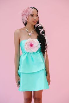 This flirty mint strapless babydoll dress is perfect for your next night out. With a cute pink flower on the chest and a mid-thigh length, you'll be the center of attention. The perfect combination of sweet and sassy! All orders are currently shipping within 14 business days. To receive item quicker, expedited shipping is available at checkout. Strapless Babydoll Dress, Mint Dress, Cheer Dance, Baseball Trucker Hat, Bride Accessories, Usa Dresses, Swimsuit Cover Ups, Swimsuit Cover, Custom Hats