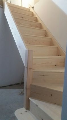 the stairs are made of wood and have no railings