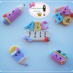 the letters and numbers are made out of fondant cake decorating supplies, such as crayons