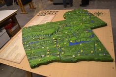 a wooden table with a map on it